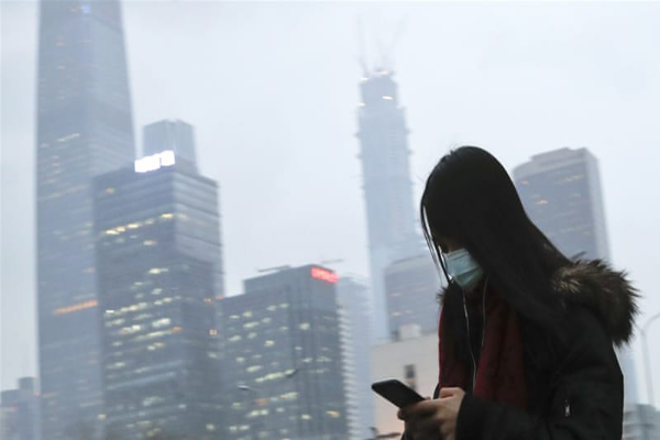 中共治下的中国，令人“雾里看花”。（AP/Andy Wong）。