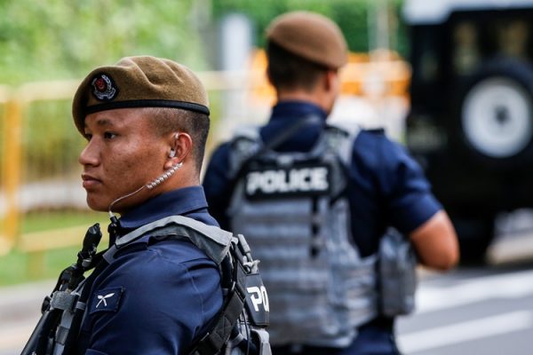 川金會川普下榻的新加坡香格里拉酒店外的警衛 （AP Photo/Yong Teck Lim）