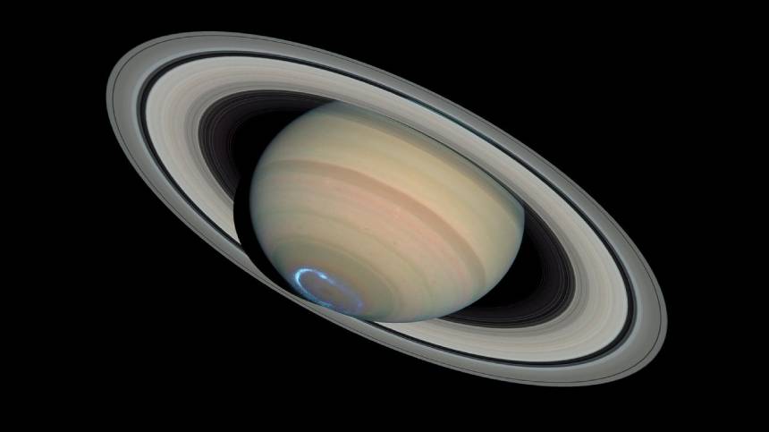 Saturn’s Rings Turning into Ice Rain and Uranus’ Moons May Harbor Warm Oceans