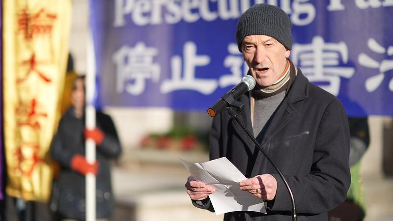 Mr. John Dee, chairman of Friends of Falun Gong in Europe, who has witnessed the persecution of Falun Gong practitioners peacefully and rationally for 23 years, attended today's event and delivered a speech.  (Photo source: Yan Ning/UK)