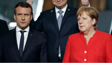 圖中爲德總理默克爾和法總統馬克龍（AP圖片）。